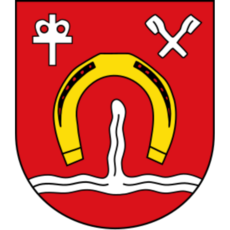Stadtwappen von Volmerdingsen mit goldenem Hufeisen, silbernen Wellen, kirchlichem Symbol und gekreuzten Bergbauwerkzeugen auf rotem Grund