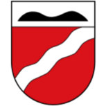 Stadtwappen des Stadtteils Dehme in Bad Oeynhausen mit rotem Schildgrund, zwei schwarzen Hügeln und silbernem Wellenstreifen