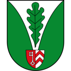 Stadtwappen von Lohe in Bad Oeynhausen mit grünem Eichenblatt, silbernem Keil und Herzschild mit Schlüssel und roten Sparren
